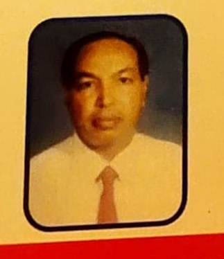 Photograph of M Abul Kasem printed on the honour memento